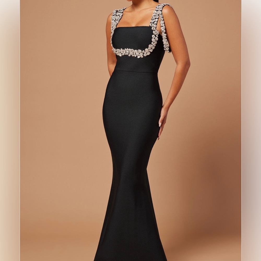 Gorgeous black gown with diamonds embellishing.